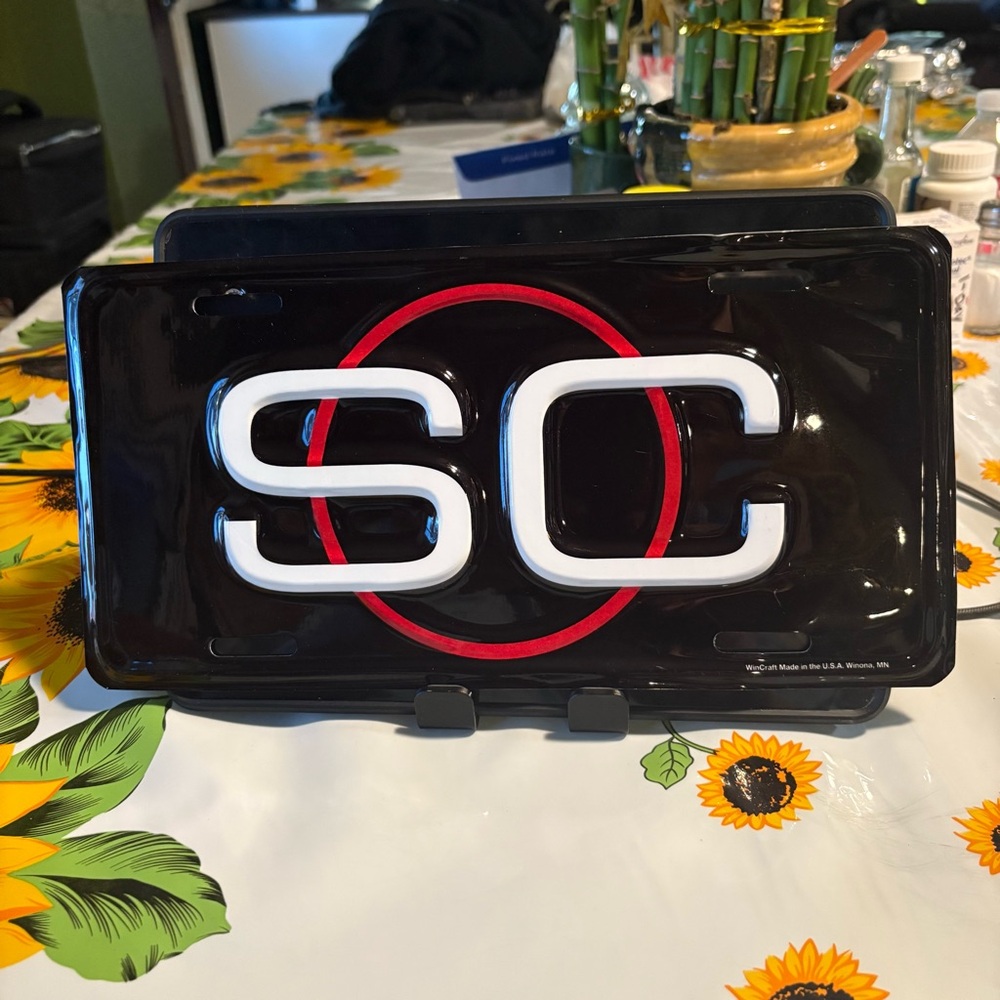 Black License Plate with SC Logo